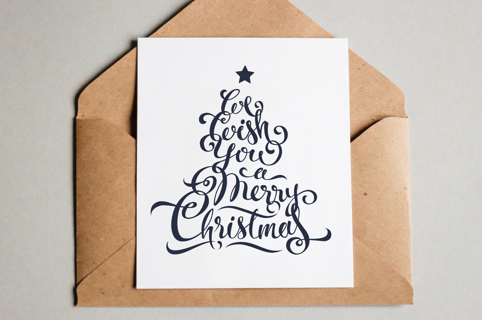 Merry Christmas Calligraphy on Yellow Images Creative Store