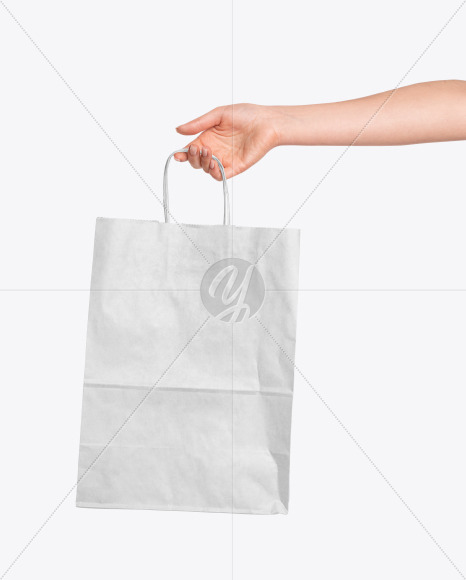 Download Hand Holding A Paper Bag Mockup In Packaging Mockups On Yellow Images Object Mockups