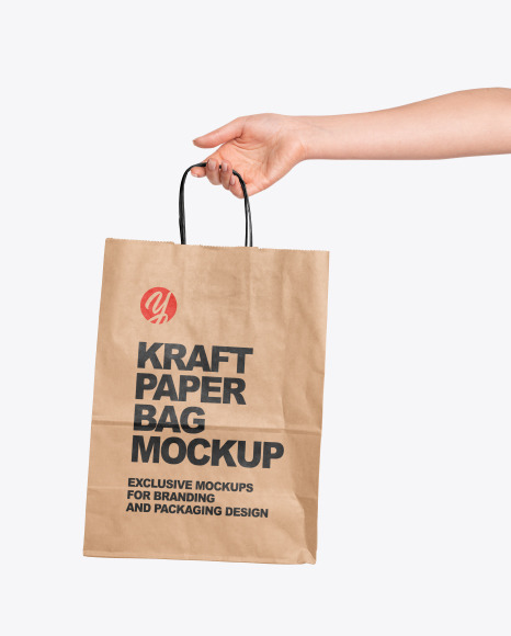 Download Hand Holding A Paper Bag Mockup In Packaging Mockups On Yellow Images Object Mockups PSD Mockup Templates