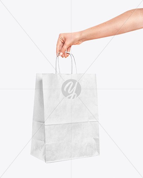 Download Hand Holding A Paper Bag Mockup In Packaging Mockups On Yellow Images Object Mockups