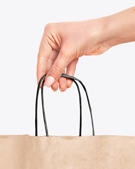 Hand Holding A Paper Bag Mockup In Packaging Mockups On Yellow Images Object Mockups