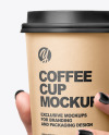Coffee Cup in a Hand Mockup