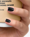 Coffee Cup in a Hand Mockup