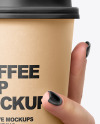Coffee Cup in a Hand Mockup