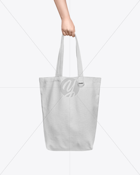 Download Cotton Bag In A Hand Mockup In Apparel Mockups On Yellow Images Object Mockups PSD Mockup Templates