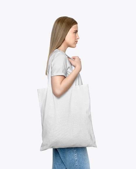 Download Girl w/ Cotton Bag Mockup in Apparel Mockups on Yellow ...