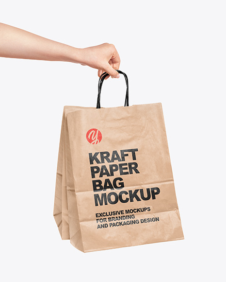 Download Hand Holding A Paper Bag Mockup In Packaging Mockups On Yellow Images Object Mockups PSD Mockup Templates