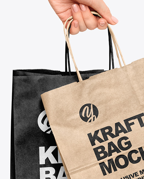 Download Hand W Two Paper Bags Mockup Yellow Author Yellowimages Mockups