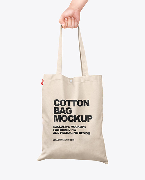 Download Cotton Bag In A Hand Mockup In Apparel Mockups On Yellow Images Object Mockups PSD Mockup Templates