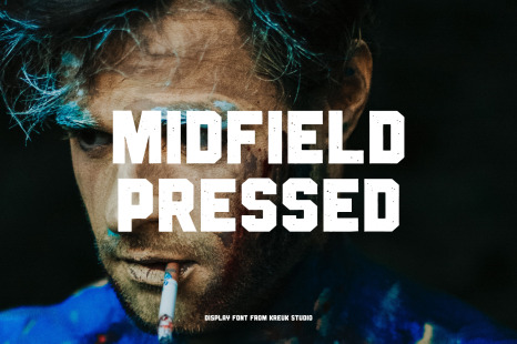 Midfield Pressed Display Font