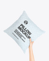Pillow in a Hand Mockup