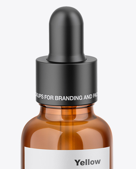 Paper Box W/ Amber Dropper Bottle Mockup in Box Mockups on Yellow