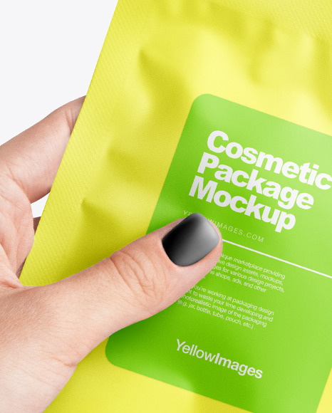 Sachet in a Hand Mockup PSD #1