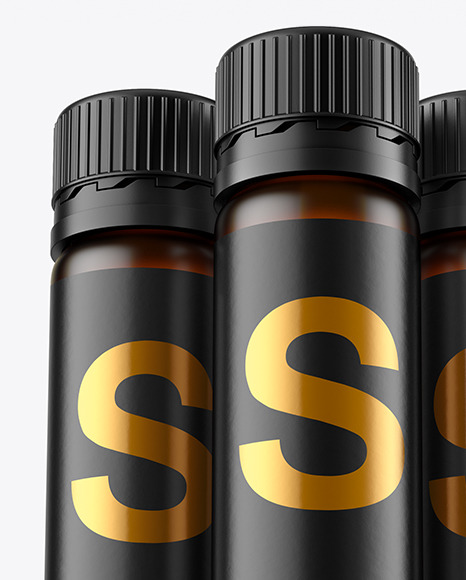 Three 25ml Dark Amber Frosted Sport Nutrition Bottles Mockup PSD #1